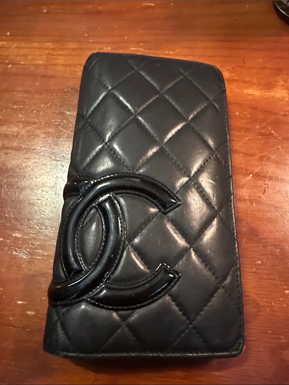 CHANEL Black Quilted Leather Wallet with Pink Interior Trim